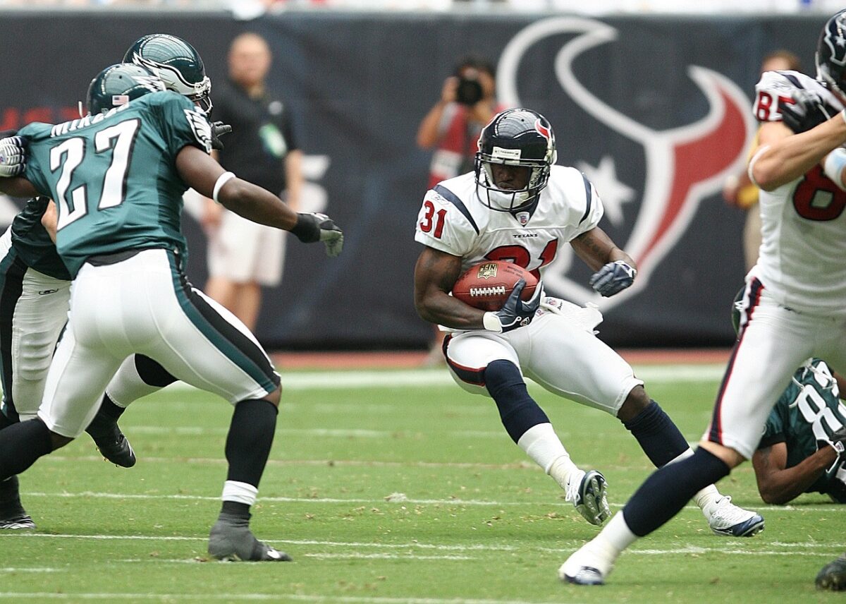 A running back tries to elude defenders in a football game, while coaches monitor his "player load" to make sure he stays fresh the entire game.