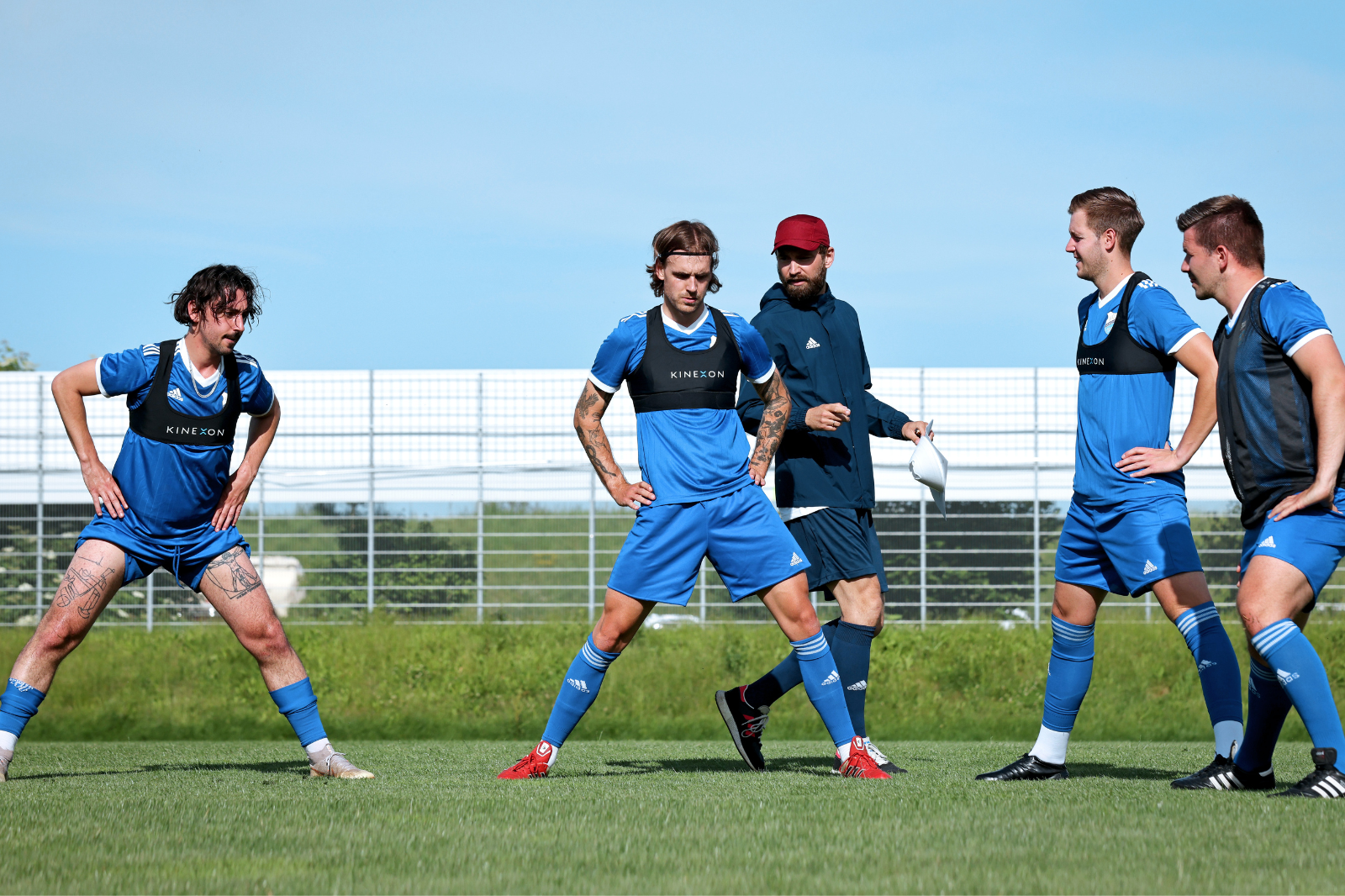 A soccer vest is worn by players in many sports, either above or underneath their playing or practice jersey.