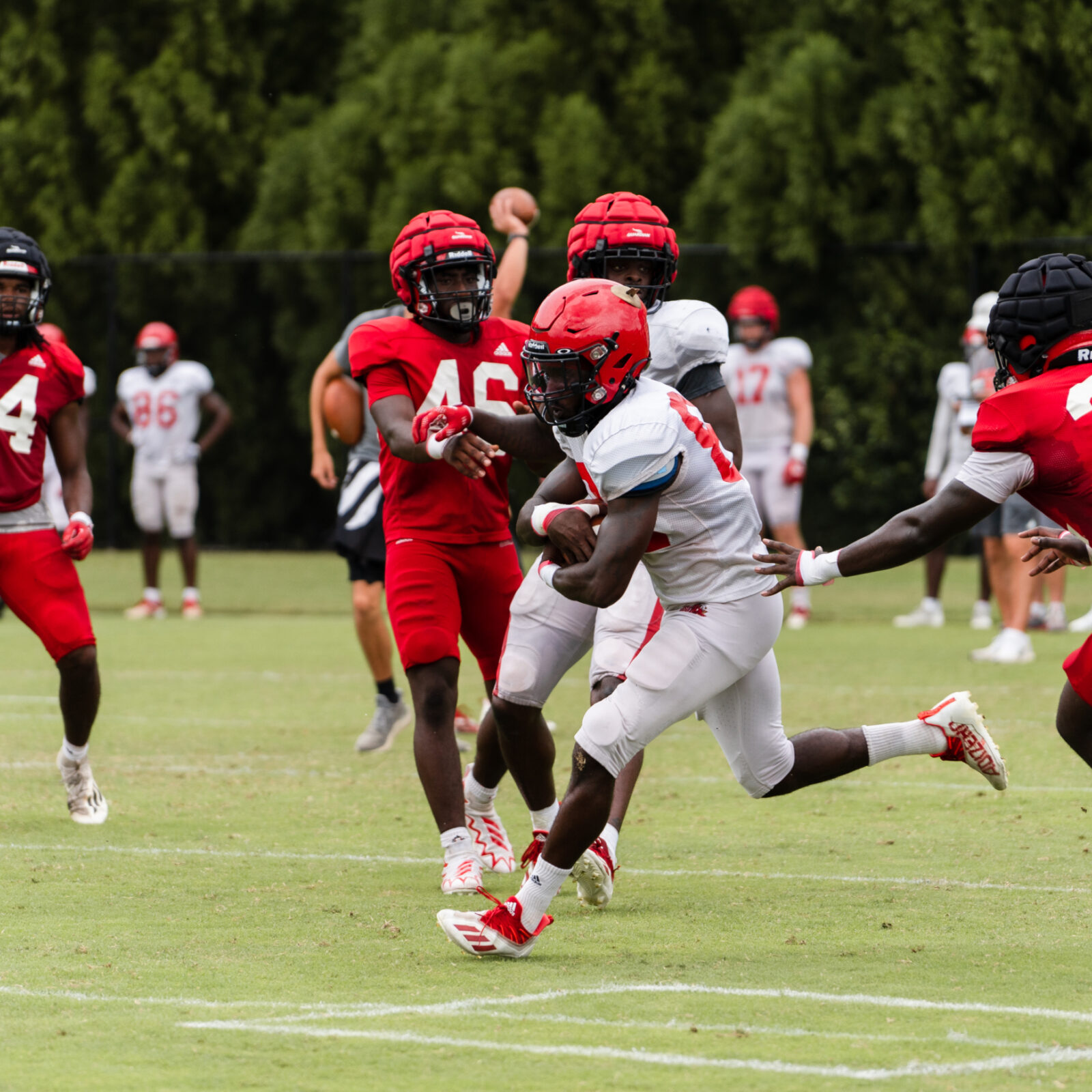 Mechanical loading is one of things sports scientists monitor with player trackers during a football game.