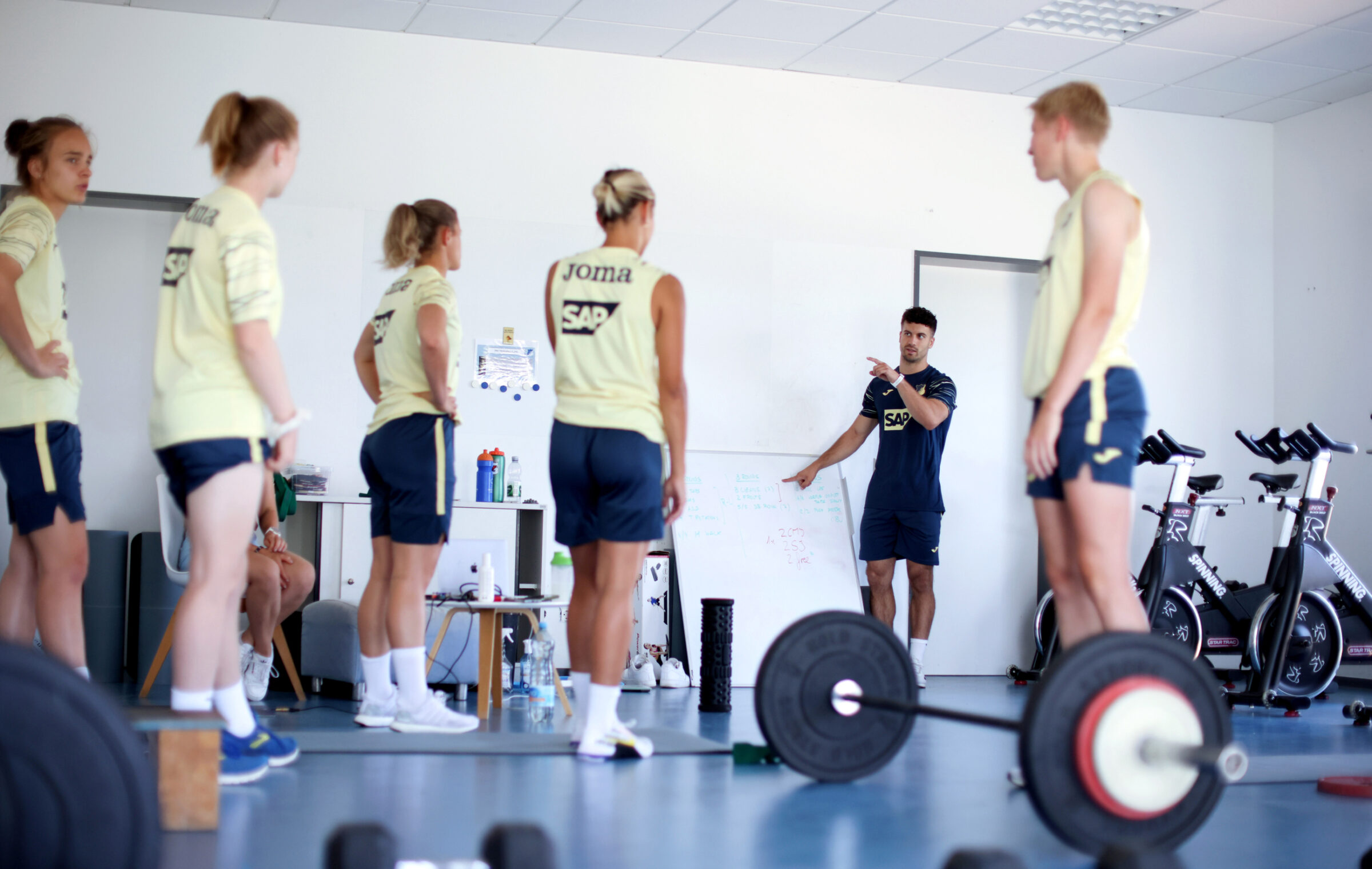 A group of women athletes work with a sports scientist to come up with a menstrual cycle workout plan.