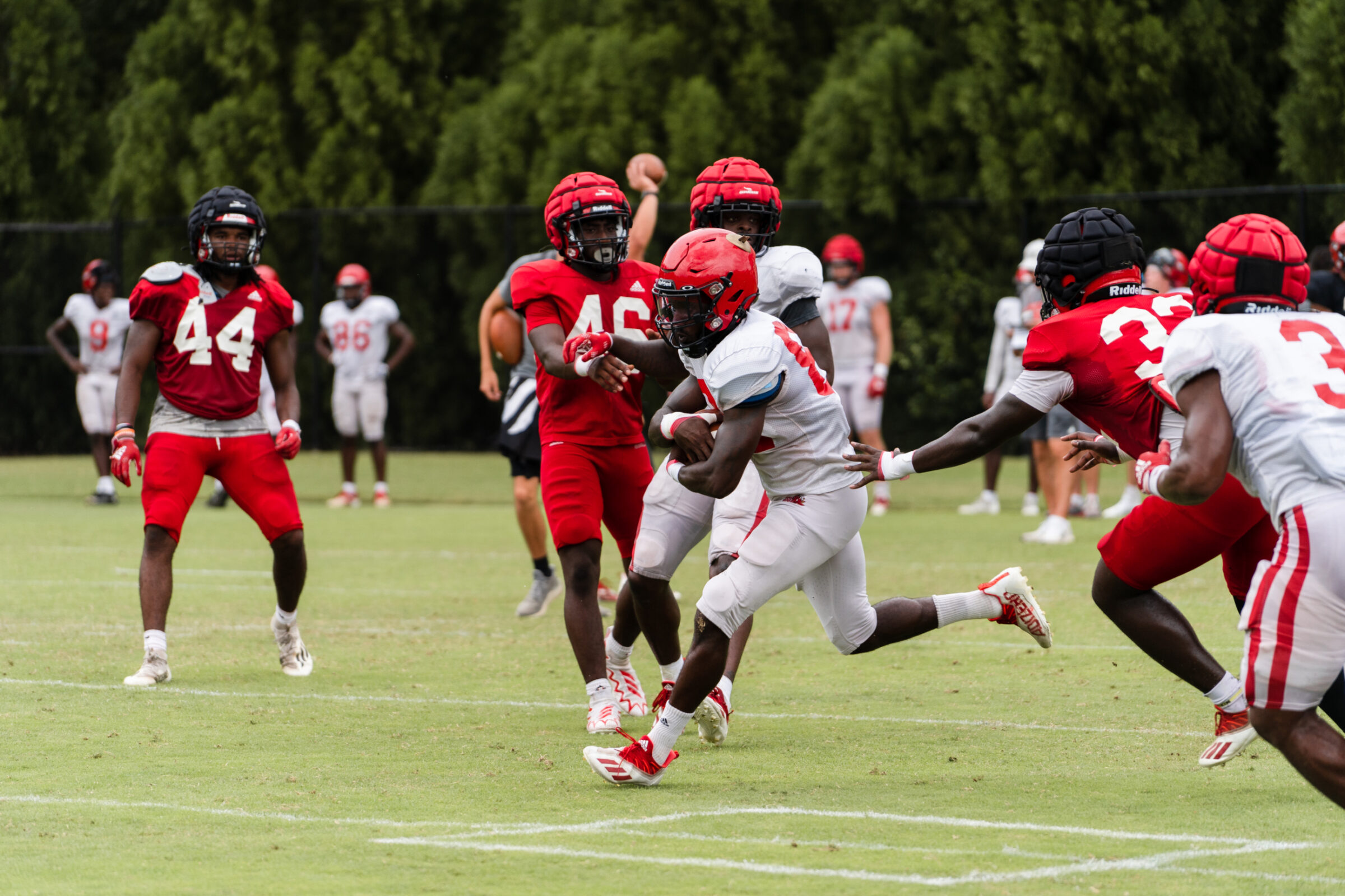 Mechanical loading is one of things sports scientists monitor with player trackers during a football game.